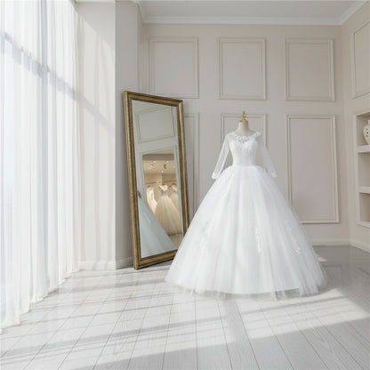 Close-up of lace and fabric detail on White Ball Gown — GownLink GLGF042B