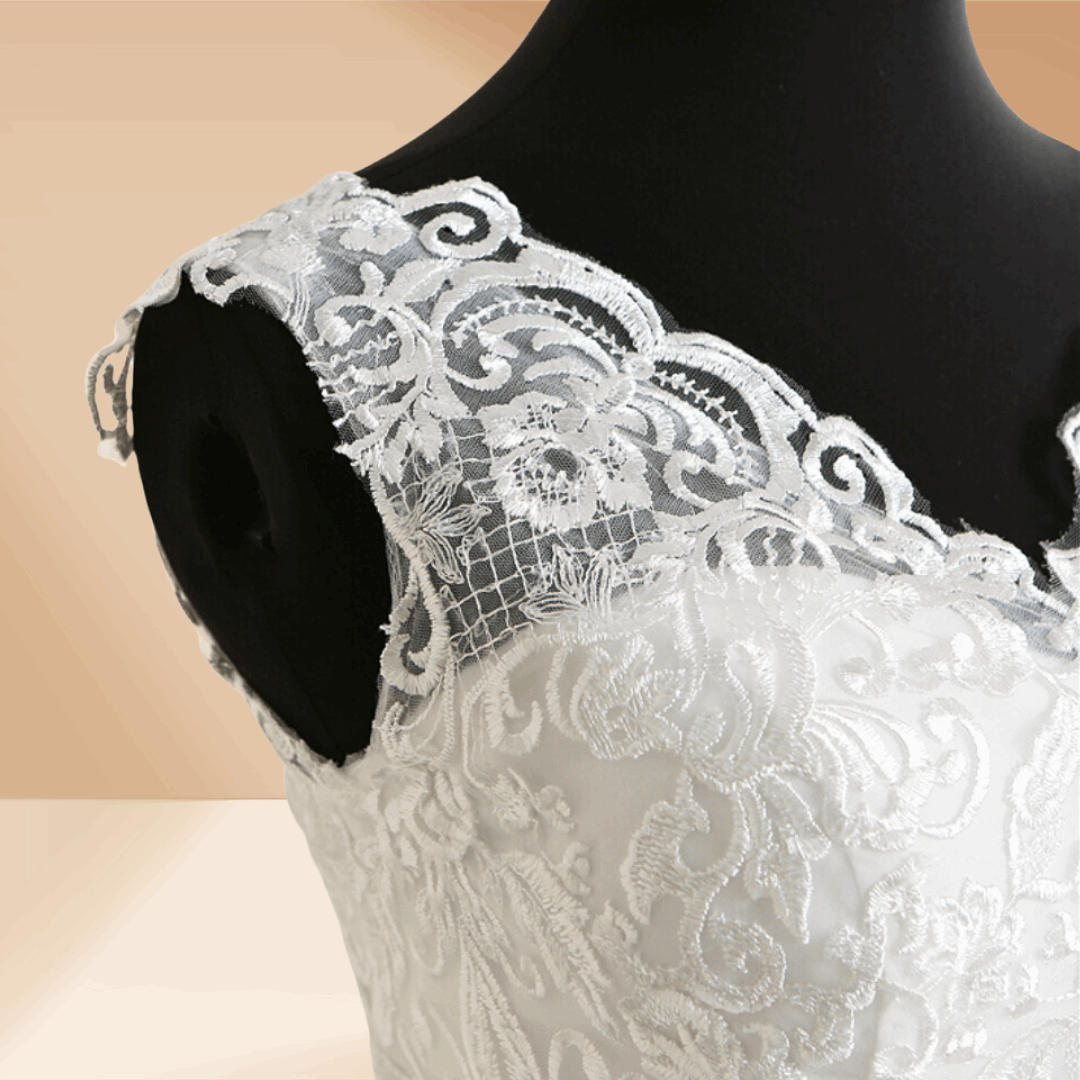 Classic white Christian ball gown with delicate lace embroidery and luxurious tulle layers