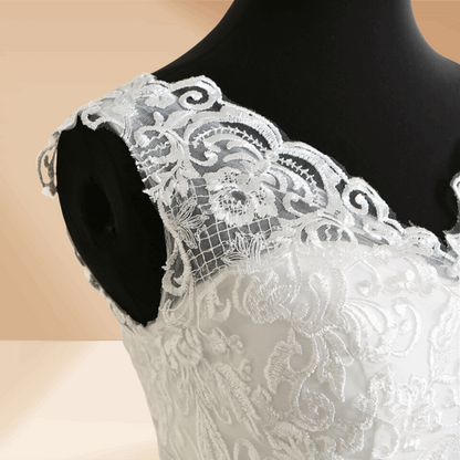 Classic white Christian ball gown with delicate lace embroidery and luxurious tulle layers