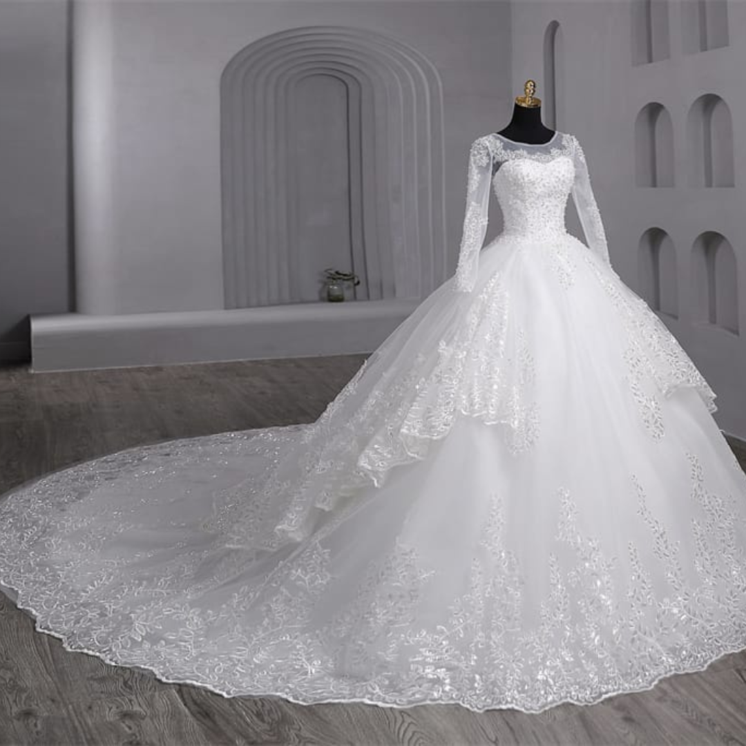 Classic white church bridal gown with embroidered lace bodice and flowing layered skirt