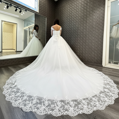 Church setting view of White Bridal Gown with Long Train — GownLink GLHSD189T