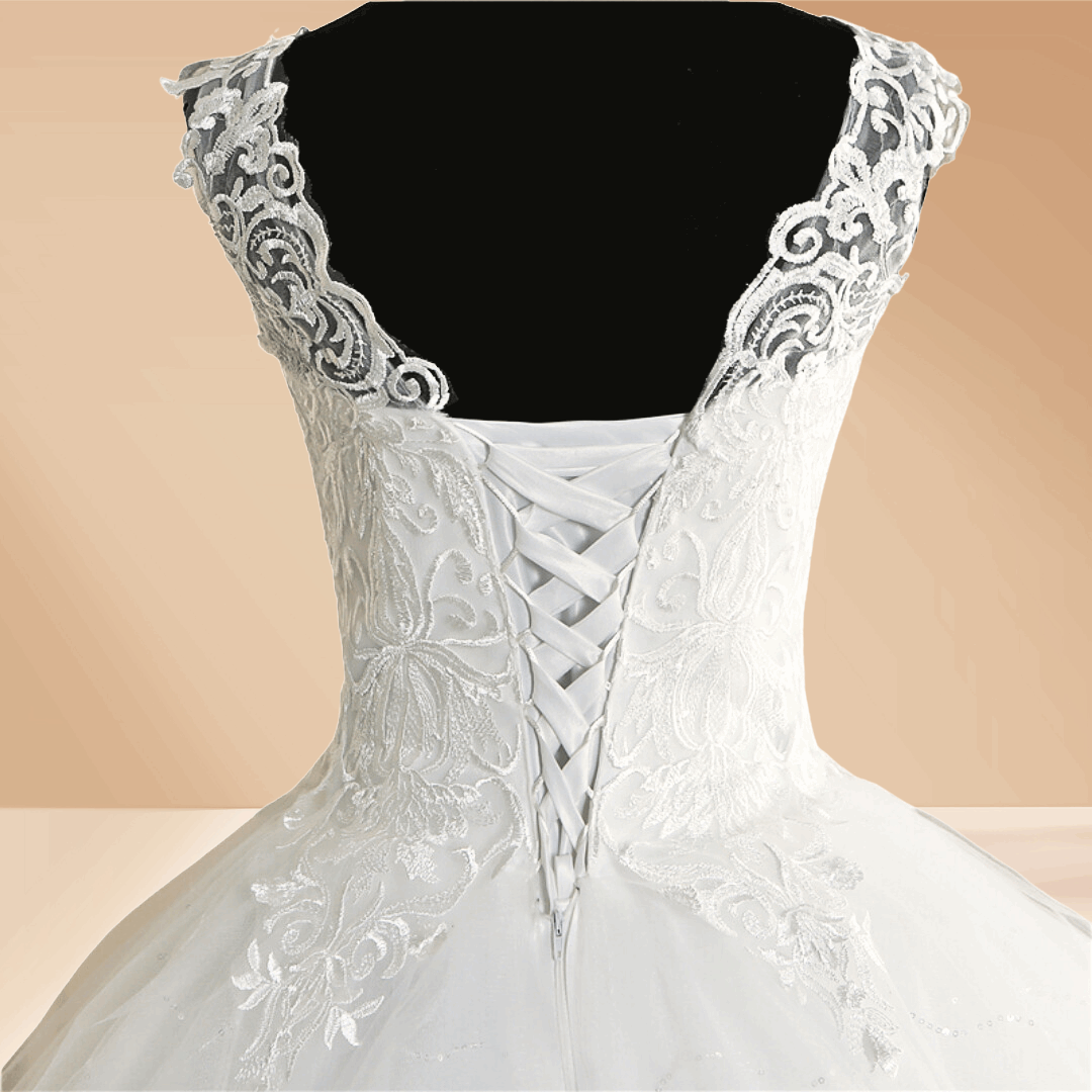 Cathedral-style Christian wedding dress with floral lace appliqué and graceful princess styling