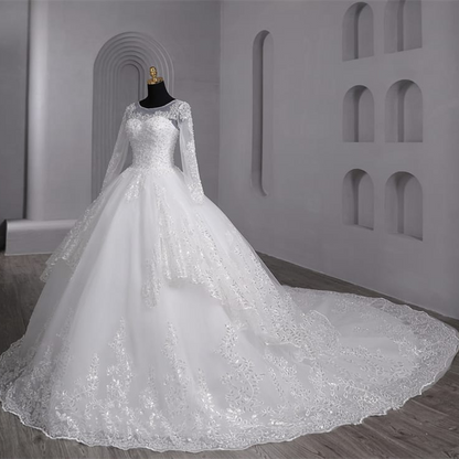 Elegant princess Christian bridal gown with floral lace details and a graceful layered train
