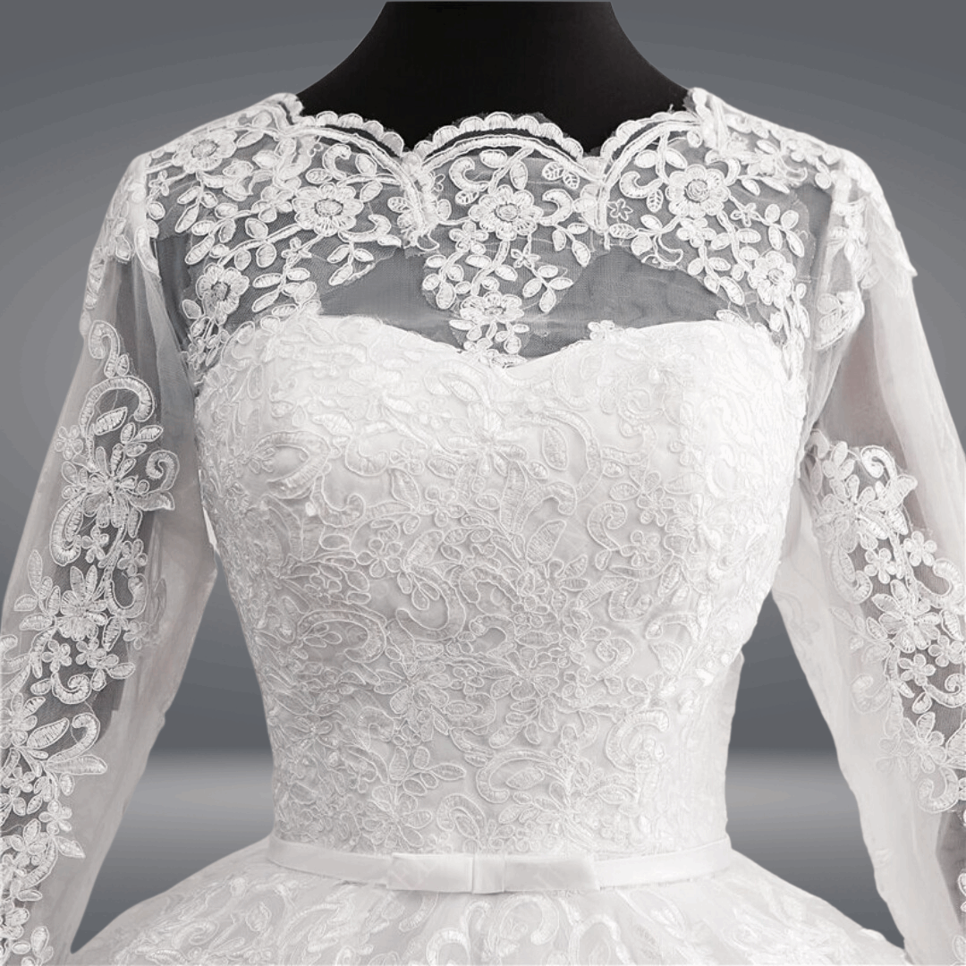 Embroidered Christian ball gown featuring floral lace details and a timeless bridal silhouette