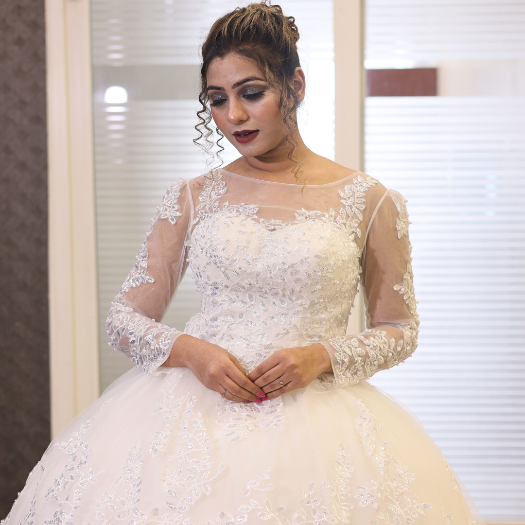 Embroidered lace Christian wedding gown with a layered tulle skirt and elegant bridal silhouette