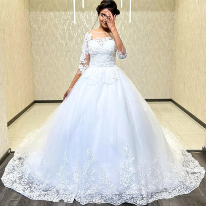 Embroidered lace Christian ball gown with premium tulle layers and romantic bridal elegance