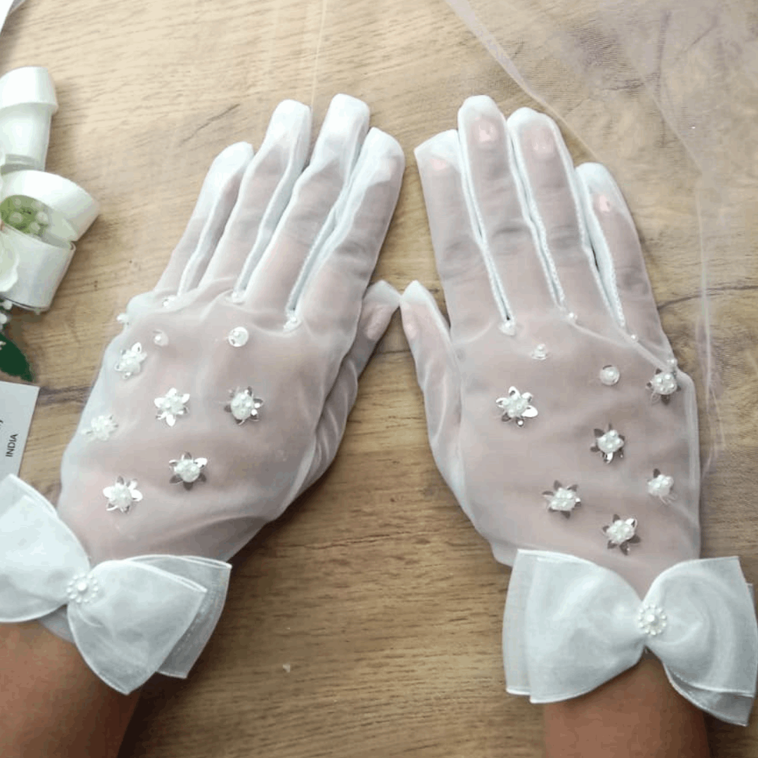 For weddings, the glove adds an ethereal touch, symbolizing unity and the beauty of the union.