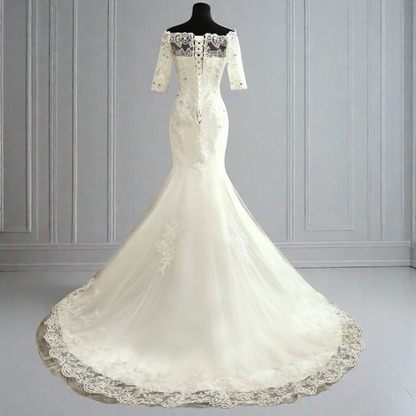 "Graceful mermaid-style Christian bridal dress Kollam India