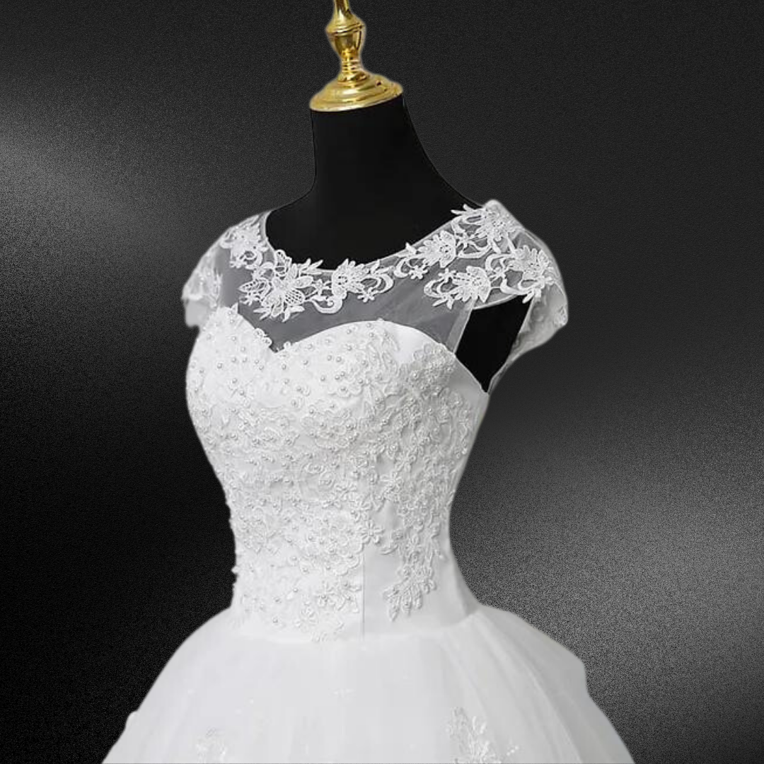 "A classic choice for the white Catholic bride seeking an enchanting wedding ball gown."