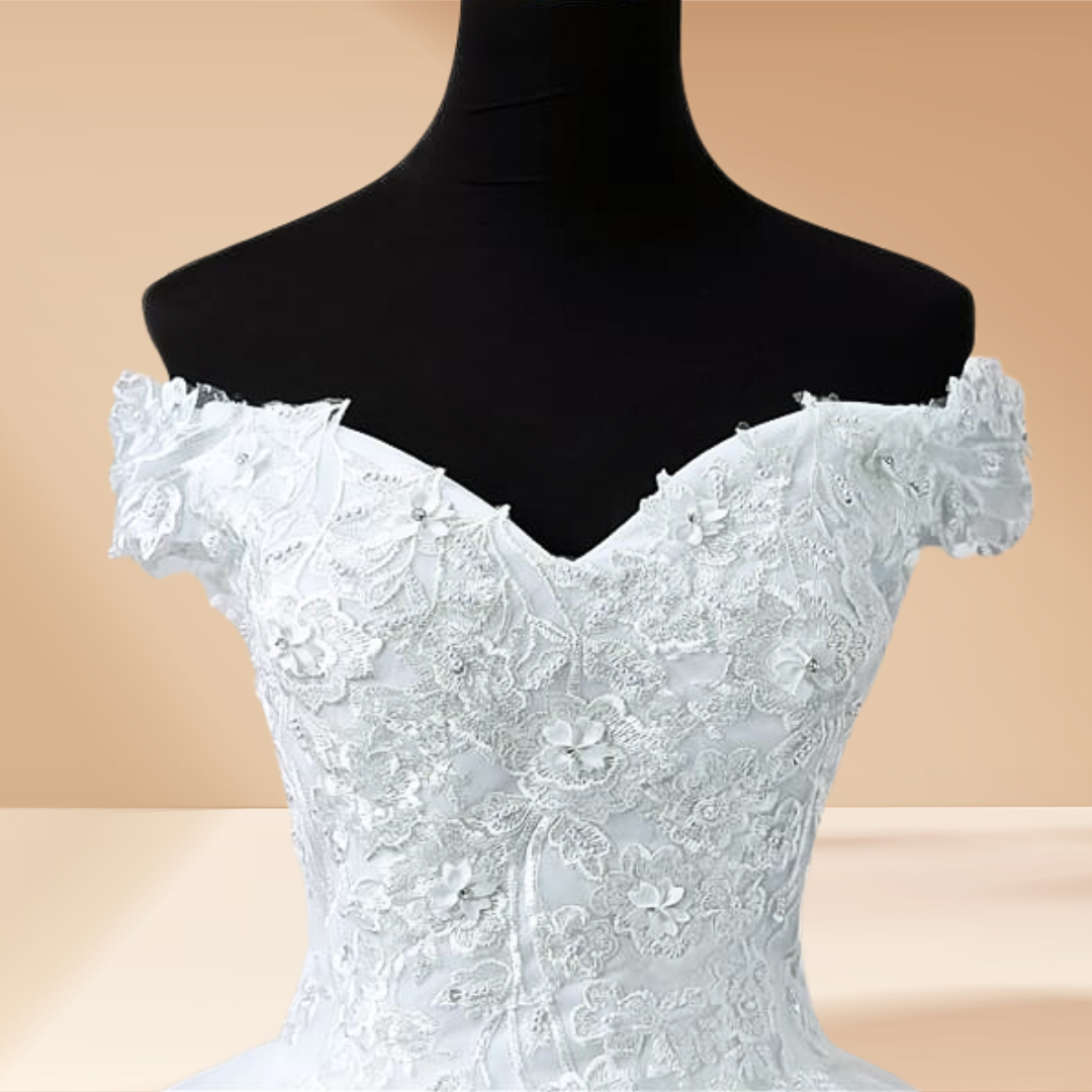 "Pearl-adorned Christian wedding gown with cathedral ball."