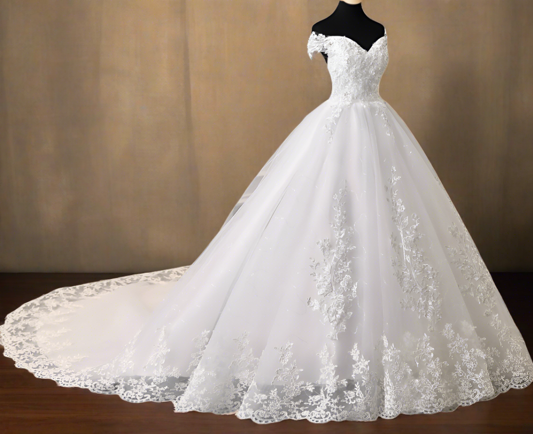 "Traditional white gown with chapel train for a Christian wedding."