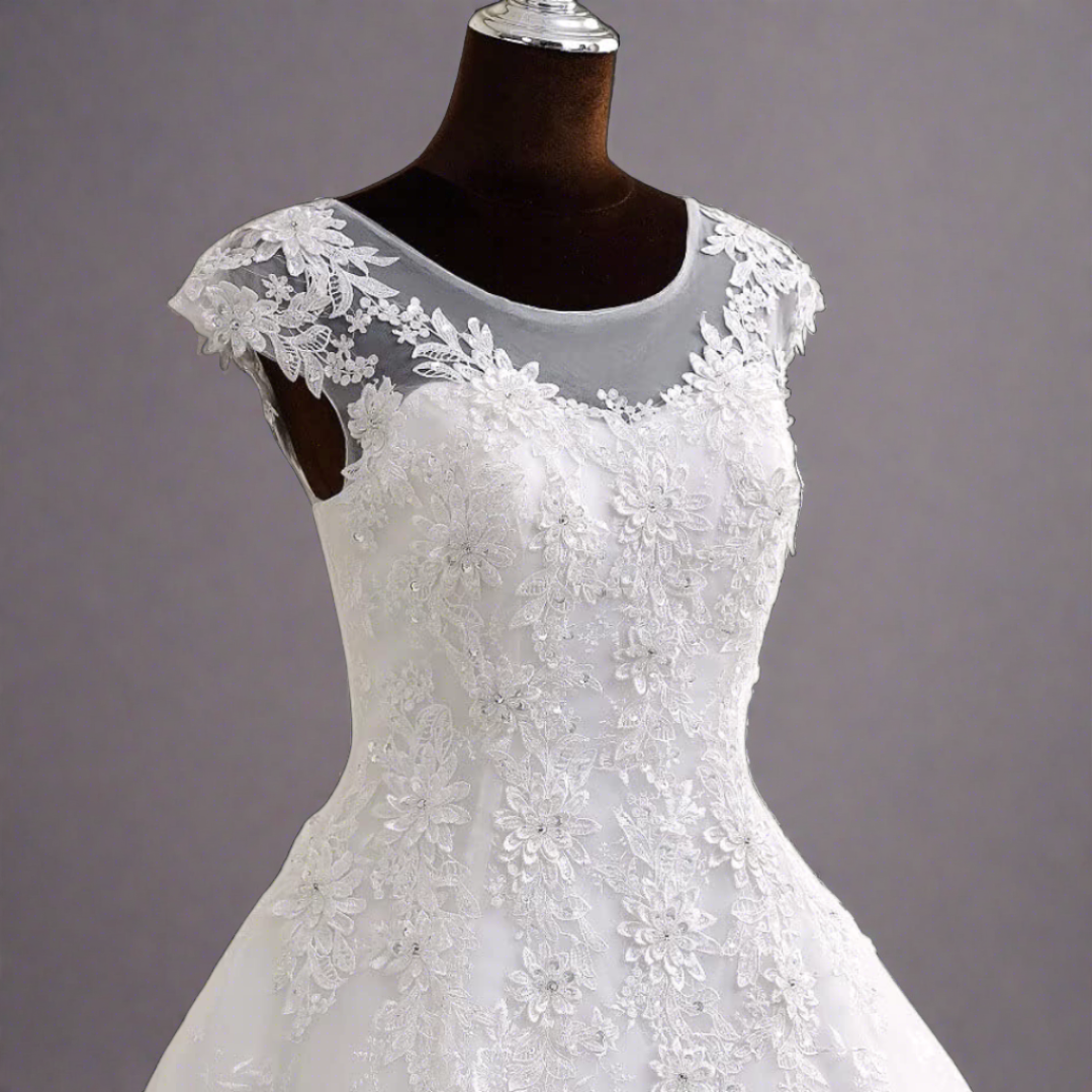 Catholic white wedding gown adorned with sparkling crystals."