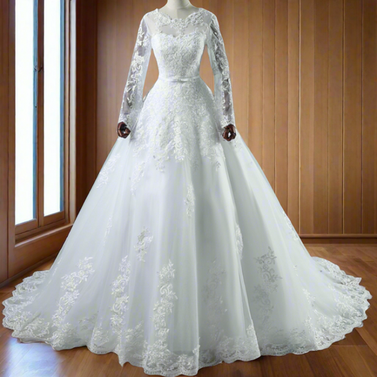 Draped Catholic white wedding gown with a statement train.