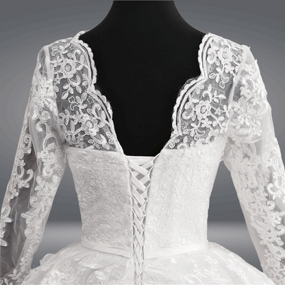 Enchanting white ball gown with a lace-up back and intricate embroidery
