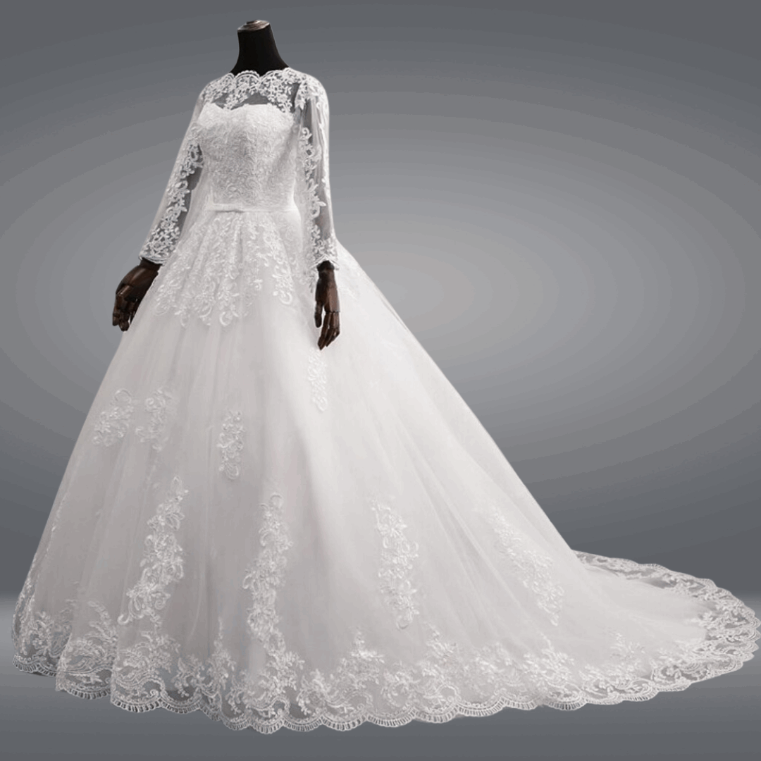 A white train bridal gown with a fitted bodice and a full skirt.