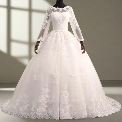 Romantic bohemian wedding gown with lace sleeves and an open back