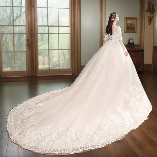 Striking Catholic white wedding Gown with a dramatic train.