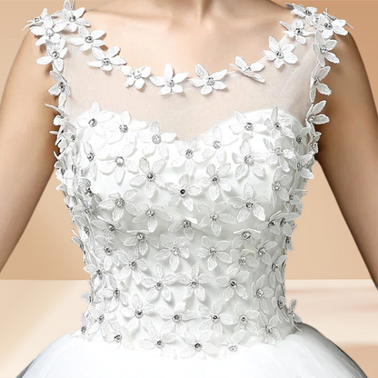 Ivory satin net gown with a sweeping ball.
