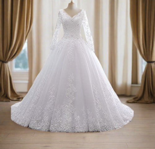 Timeless and elegant Christian white bridal gown with a regal train."