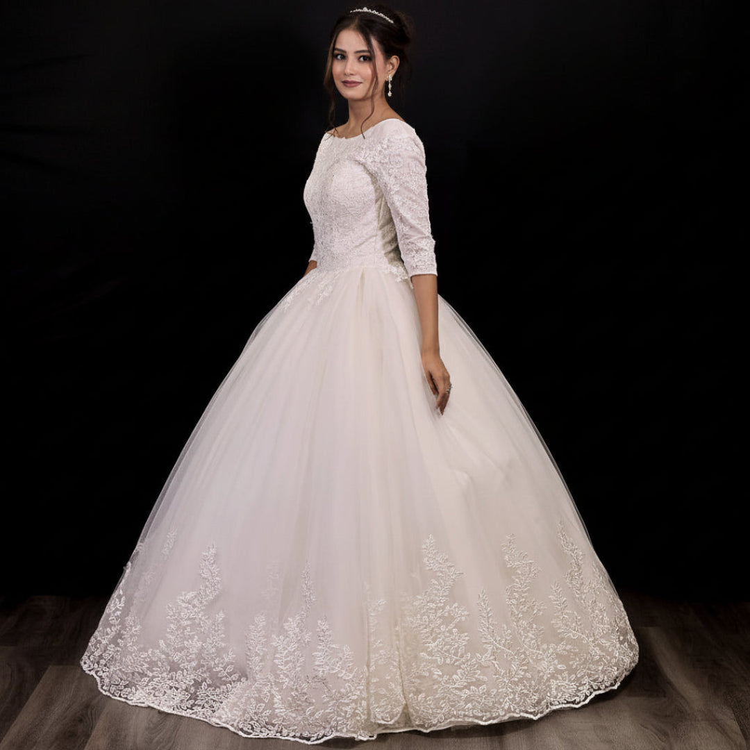 Front view of a Christian bridal ball gown with embroidered lace bodice and flowing princess skirt
