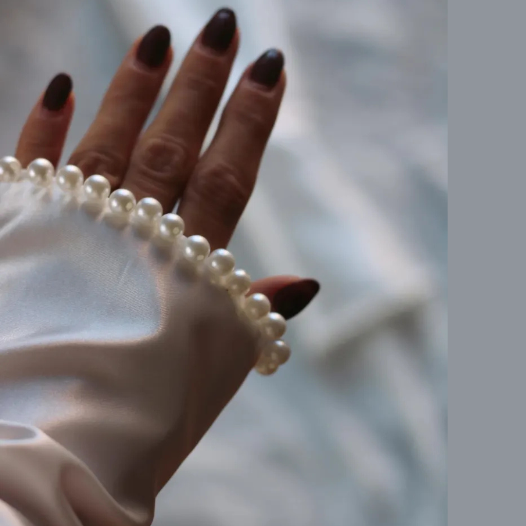 Close-up of pearl or crystal detail on Bridal Gloves — GownLink G11