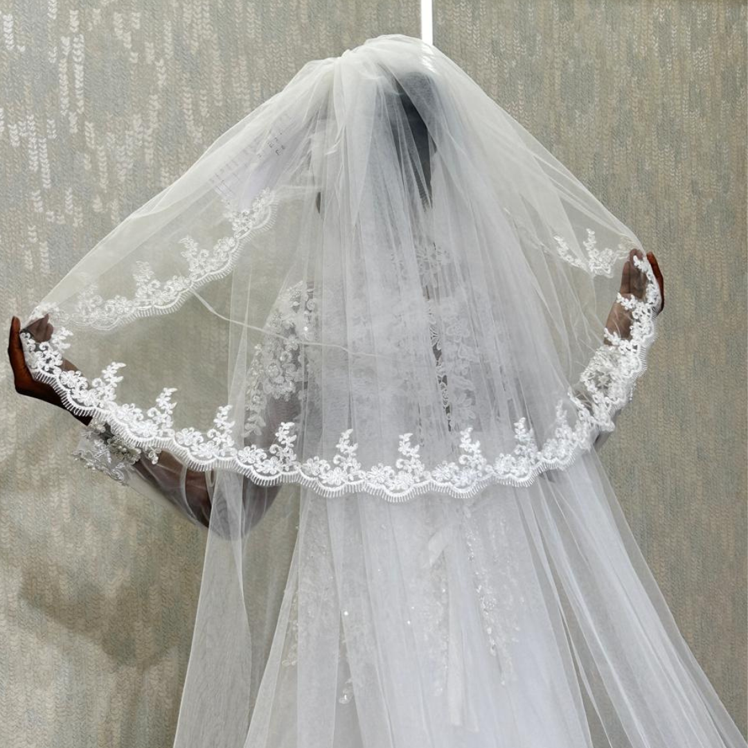 Model wearing Bridal Veil with bridal gown — GownLink GLVHL31