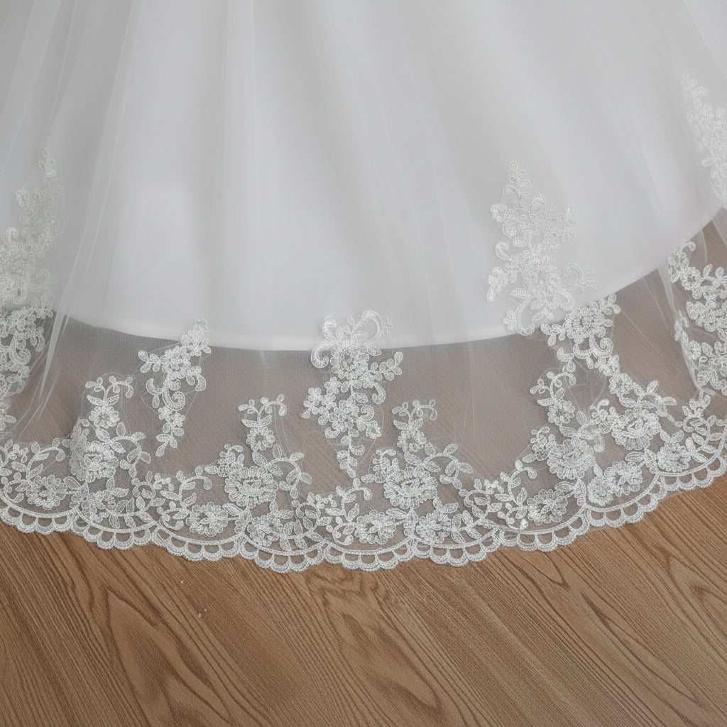 GownLink cathedral bridal gown with intricate lace embroidery and flowing train