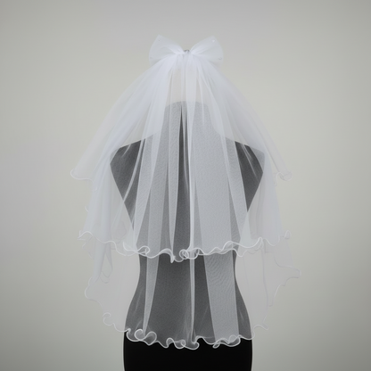 Front view of Cathedral Bridal Veil draped over model — GownLink GLVHM12