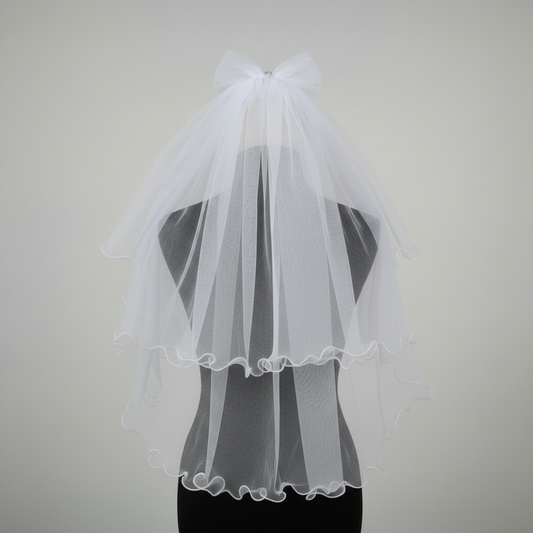 Front view of Cathedral Bridal Veil draped over model — GownLink GLVHM12