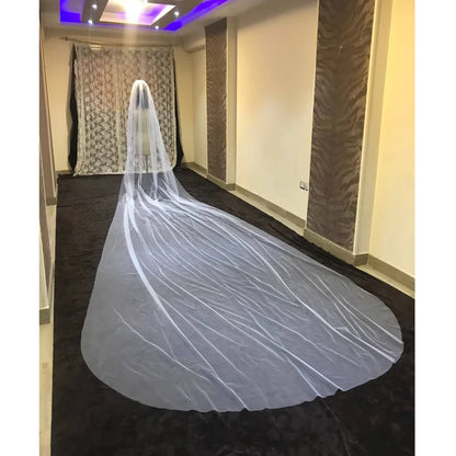 Front view of Cathedral Bridal Veil draped over model — GownLink GLVHMN1