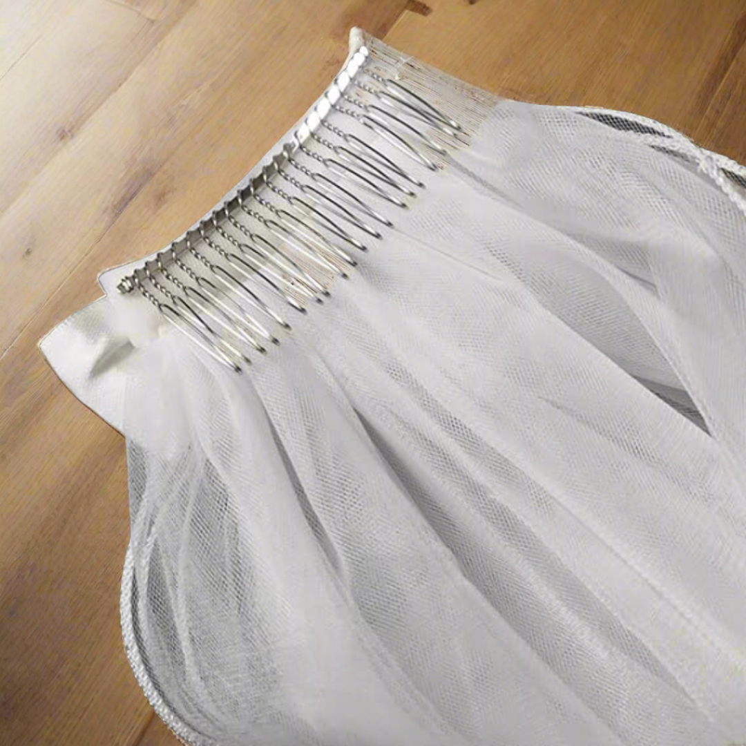 Close-up of lace edge detail on Cathedral Bridal Veil — GownLink GLVHM10