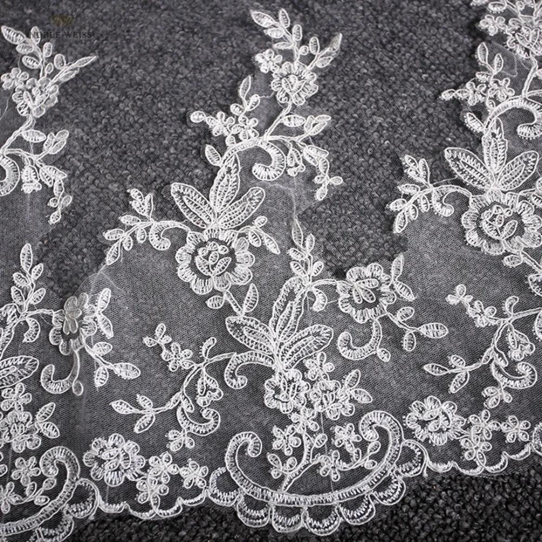 Close-up of lace edge detail on Cathedral Bridal Veil — GownLink GLVP20