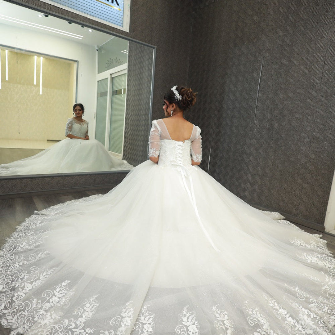 Full-length photo of bride in GownLink Christian wedding gown 