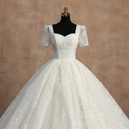 Detail of neckline and bodice on White Ball Gown — GownLink GLGT166B