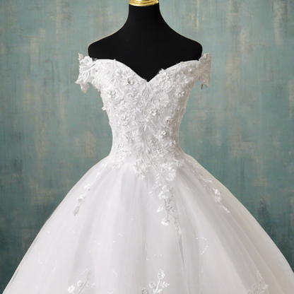 Cathedral train wedding gown with scalloped lace hem by GownLink