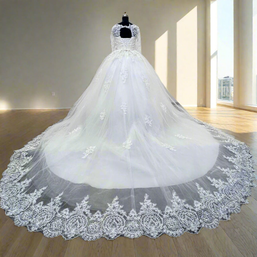 Designer white bridal ball gown with lace train by GownLink