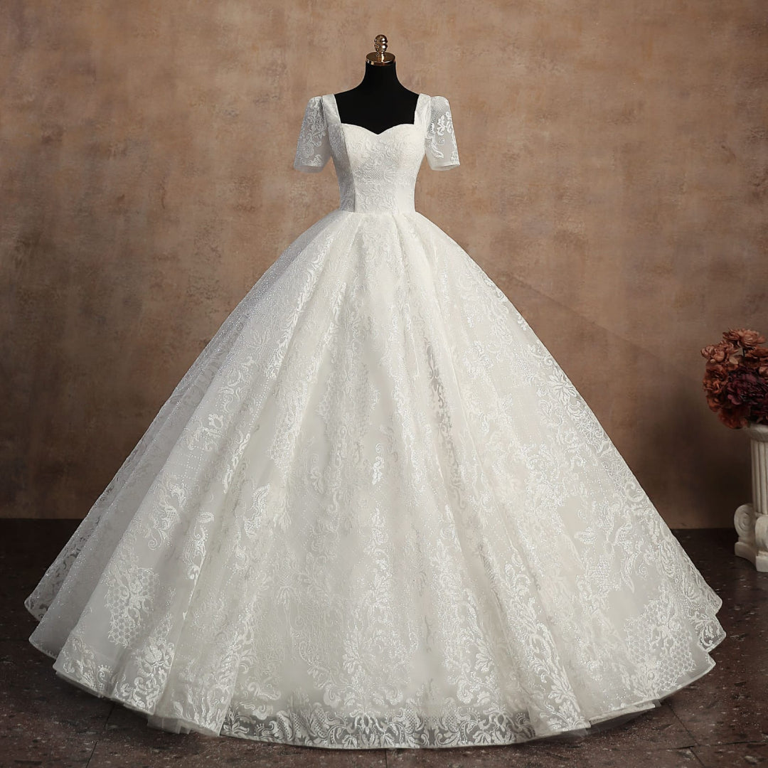 Close-up of lace and fabric detail on White Ball Gown — GownLink GLGT166B