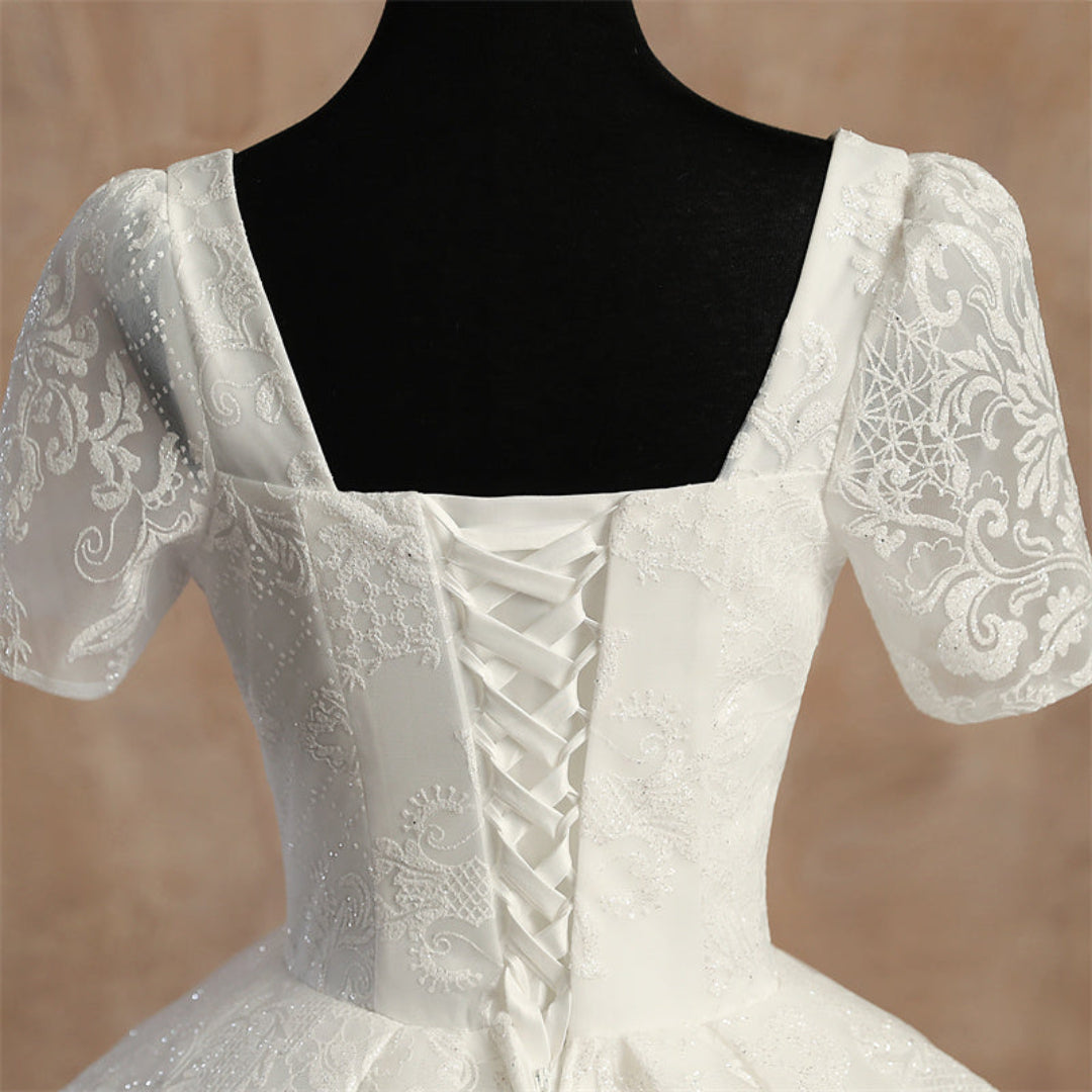 Side profile view of White Ball Gown showing silhouette — GownLink GLGT166B