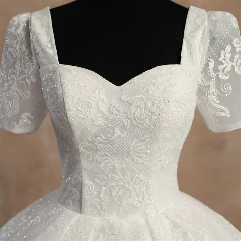Hem and train lace detail on White Ball Gown — GownLink GLGT166B