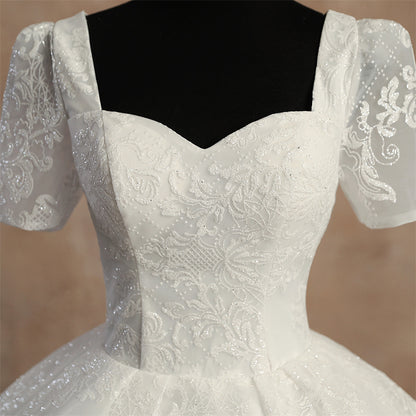 Hem and train lace detail on White Ball Gown — GownLink GLGT166B