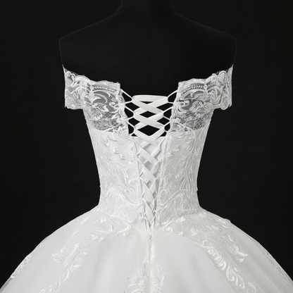 Detail of neckline and bodice on White Ball Gown with Off Shoulder — GownLink GLQD09T