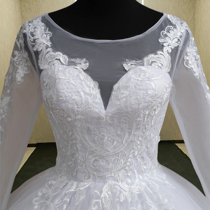 Lace appliqué skirt detail on GownLink wedding ball gown