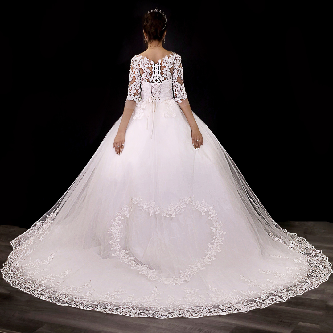 Leafy lace appliqué train detail on GownLink wedding gown