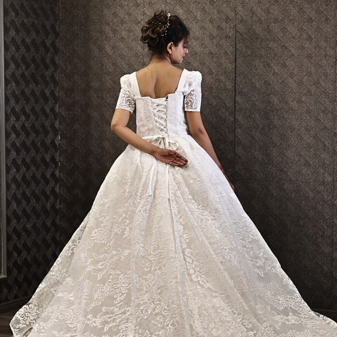 Back view of White Ball Gown showing train and closure detail — GownLink GLGT166B