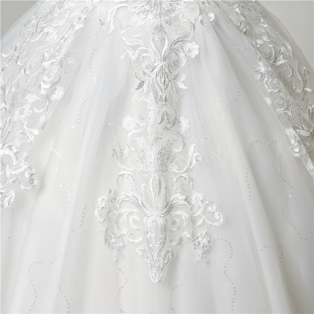 Sleeve detail close-up on White Ball Gown with Off Shoulder — GownLink GLQD09T