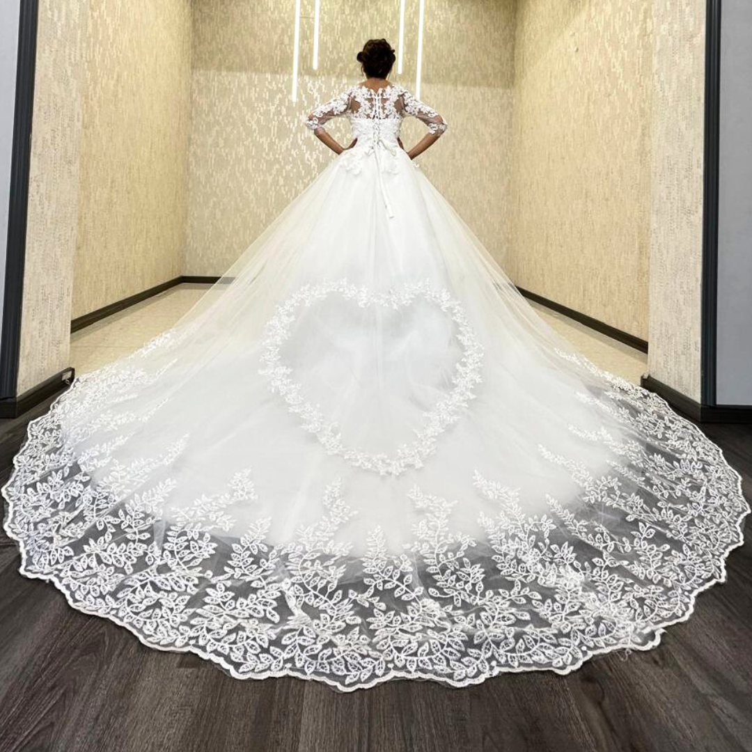 Sheer lace three-quarter sleeves on GownLink bridal wedding gown