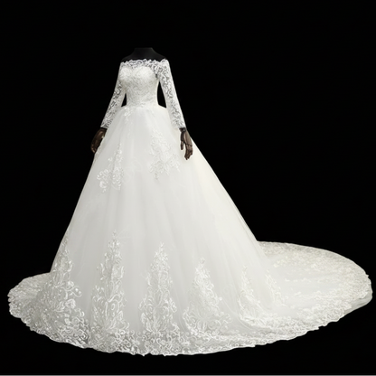 Front view of White Bridal Gown with Off Shoulder on model against studio backdrop — GownLink GLQD09T