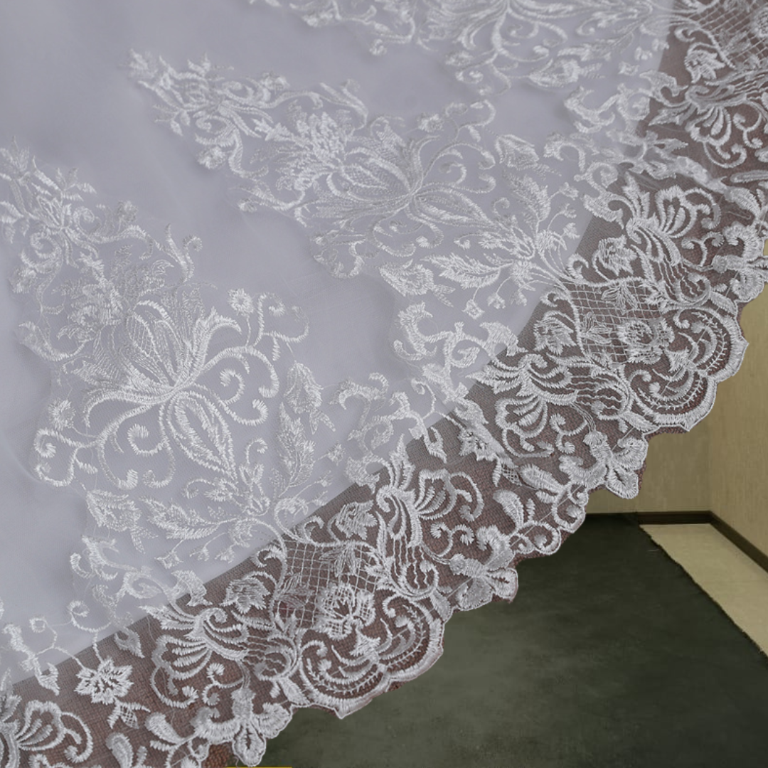 Designer white Christian wedding gown with lace train by GownLink