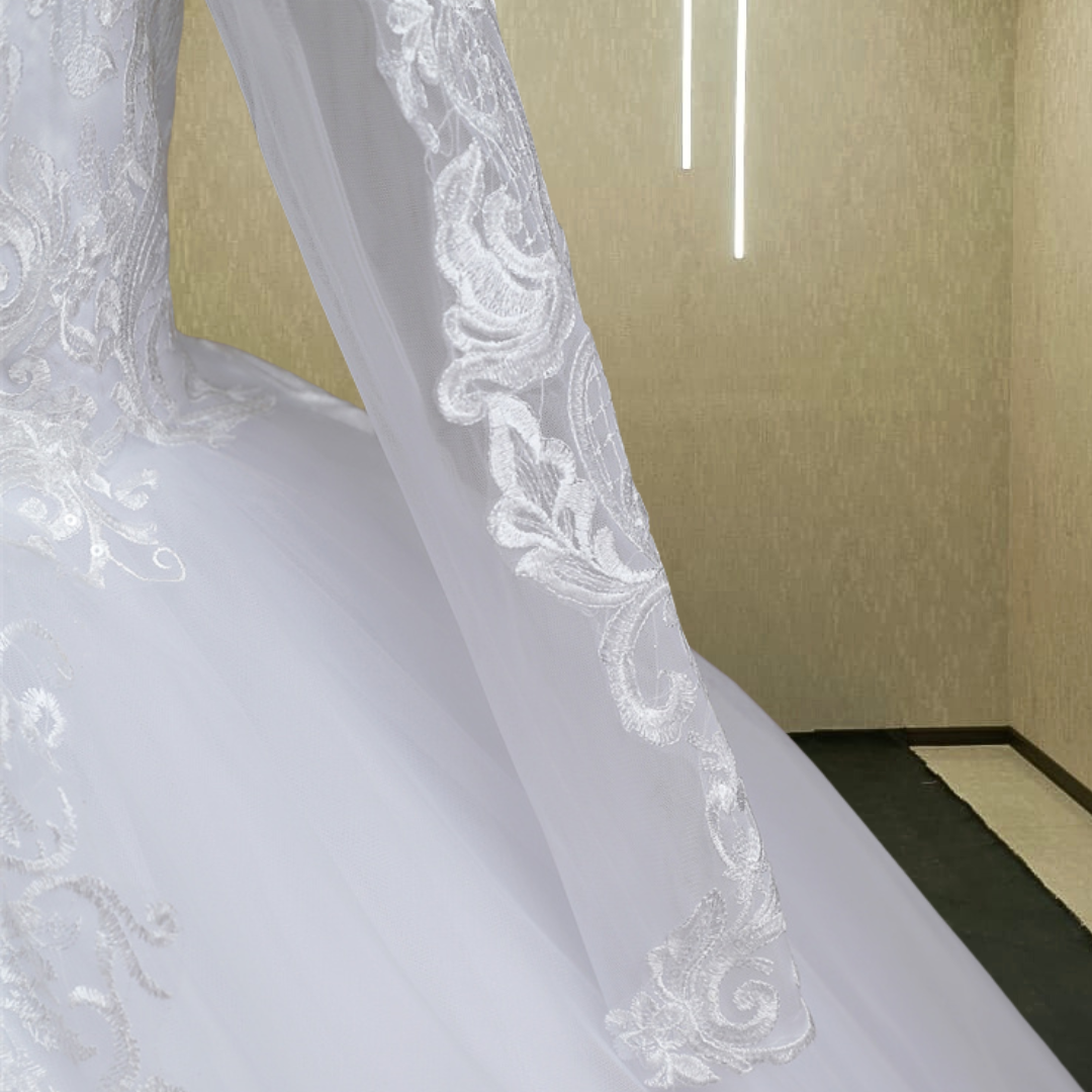 Scalloped lace hem detail on GownLink Christian wedding gown