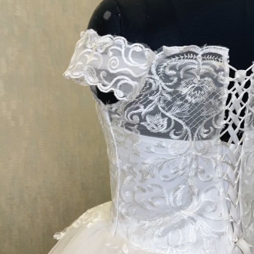 Church setting view of White Ball Gown with Off Shoulder — GownLink GLQD09T
